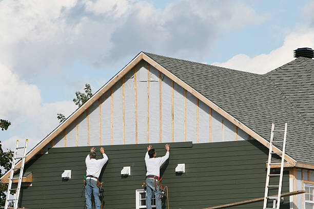Professional Siding technician working in Sharon, MA